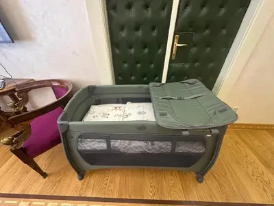 a suitcase sitting in a room next to a door at Djuras residence in the center of Belgrade in Belgrade