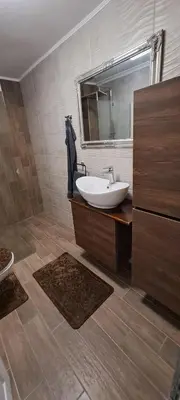 a bathroom with a sink and a mirror at Vila Felicita in Sremski Karlovci