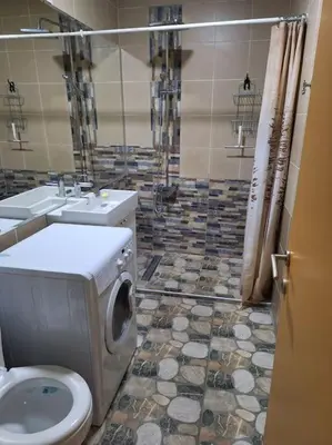 a bathroom with a toilet and a sink at Apartment Casper in Belgrade