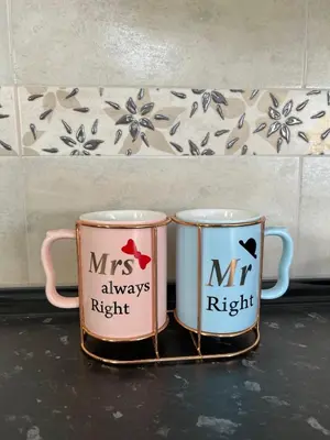 two mrs andms always right mugs sitting on a counter at Apartman 24 in Arandjelovac