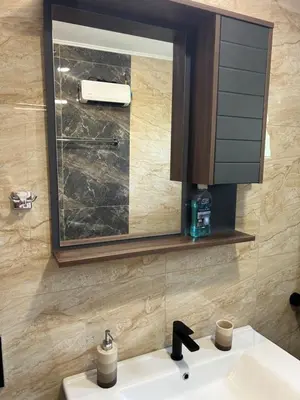 a bathroom with a sink and a mirror at Kosmaj Ruža vetrova in Sopot