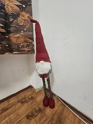 a santa hat hanging on the corner of a wall at Kalina Apartman in Belgrade