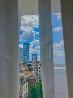 a view of a city from a window at Move In Apartments - ApartHotel Belgrade in Belgrade