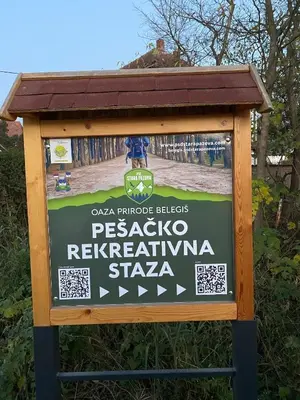 a sign for a pescado restaurant in a park at Danube Oasis Stevantown 1 in Stari Banovci