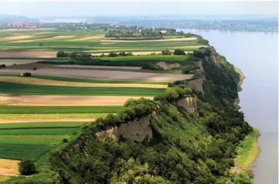 an island in the middle of a body of water at Danube Oasis Stevantown 3 in Stari Banovci