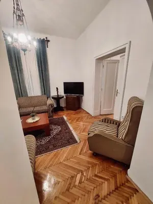 a living room with two couches and a television at Sweet House Kalemegdan in Belgrade