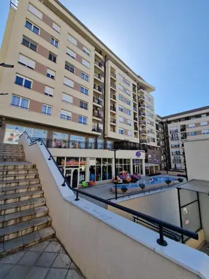 a building with stairs in front of a building at Plavi Paun Apartman in Belgrade