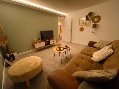 a living room with a couch and a table at Osho in Smederevo