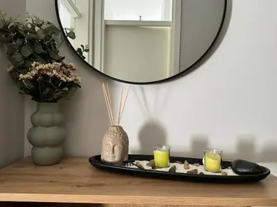 a tray of food on a table with a mirror at Fairy tale apartment 8 in Voždovac