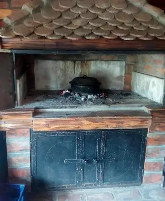 an old stove with a pot on top of it at Etno selo Smederevo PEPE- Serbia in Landol