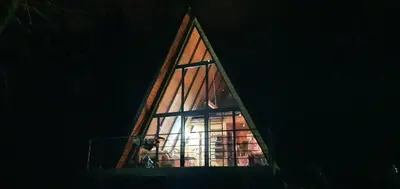 a window of a building with light coming through it at Woodnest in Čortanovci