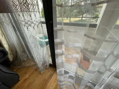 a view of a window with a curtain at Lux Tea Pancevo in Pančevo