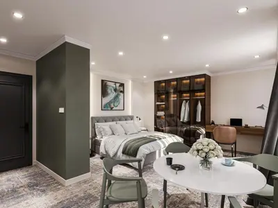 a bedroom with a bed and a table and chairs at Black Gallo Residences in Belgrade