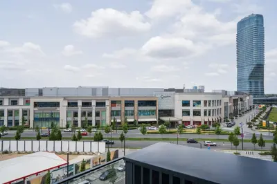 a view of a city with buildings and a parking lot at Libera Luxe Residence in Belgrade