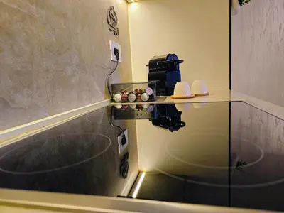 a bathroom with a sink and a glass counter at ARTA LUX - Galerija Beograd na vodi - Belgrade Waterfront in Belgrade