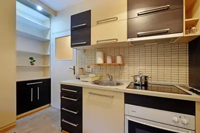 a kitchen with a sink and a counter top at Skadarlija discovery Beograd centar lux in Belgrade