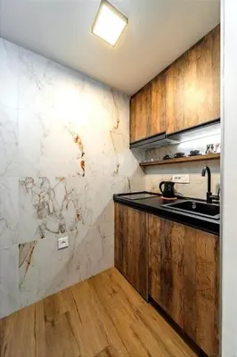 a kitchen with a sink and a counter top at Dark Nest 1 Belgrade Apartments in Zvezdara