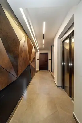 a hallway in a building with a door and a hallway sidx sidx sidx at Dark Nest 1 Belgrade Apartments in Zvezdara