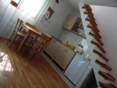 an overhead view of a kitchen with wooden floors at Apartment Vracar in Belgrade