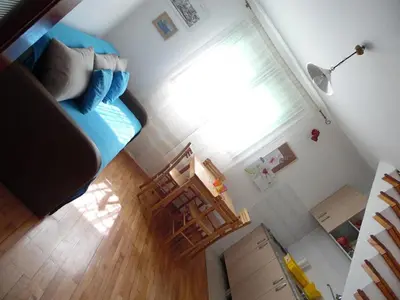 an overhead view of a bedroom with a bed and a window at Apartment Vracar in Belgrade