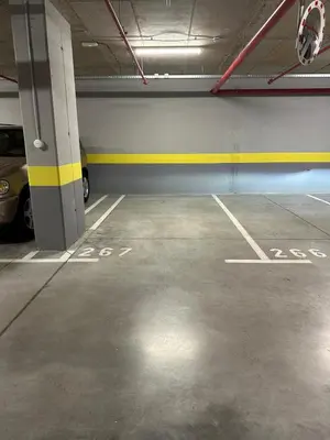 a parking garage with a car parked in it at K District apartment Belgrade - central BG, private parking in Belgrade
