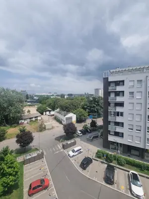 an aerial view of a parking lot next to a building at Laguna in Bežanija