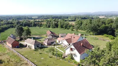 an aerial view of a estate with houses at La Corte Delle Rose UB in Ub