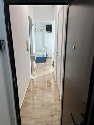 a hallway leading to a room with at MUNJA Apartman in Belgrade