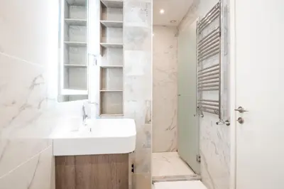 a bathroom with a sink and a shower at West Kula 14 in Belgrade