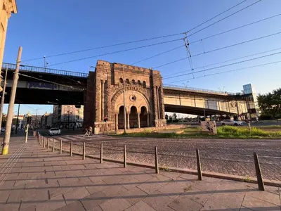 a bridge over a road with a building at RiverScapeMoments Studio in Belgrade