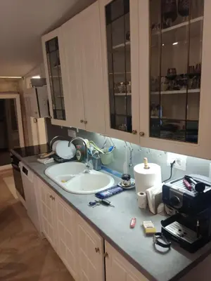 a kitchen with a sink and a counter top at Oaza lux in Dušanovac (historical)