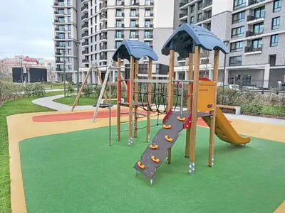 a playground with a slide in a park at Belgrade Waterfront PROMO PRICE in Belgrade