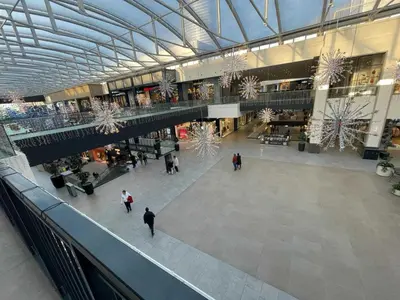 an overhead view of a shopping mall with people in it at Scala BW in Sajmište