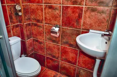 a bathroom with a toilet and a sink at Studio 600 in Belgrade
