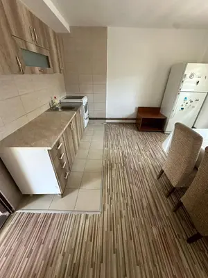 a kitchen with a sink and a counter top at BIRDS apartmani in Belgrade