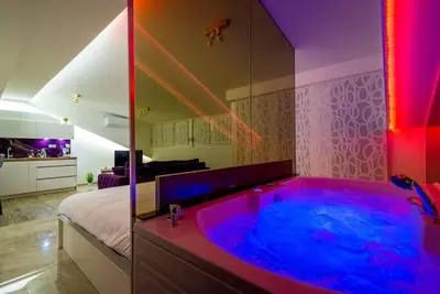 a bathroom with a large tub in a room at Boom Spa 1 Belgrade Apartments in Fontana