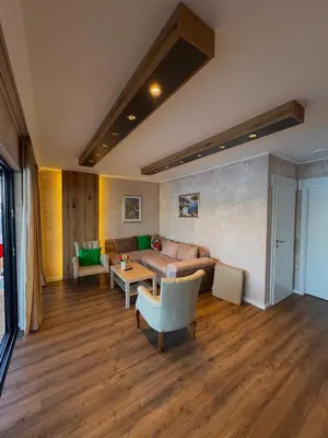 a living room with a couch and a table at Santa Barbara River in Belgrade