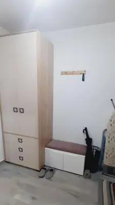 a locker room with a bench in a room at BRAND NEW Entire Place in CENTER of ZEMUN in Belgrade