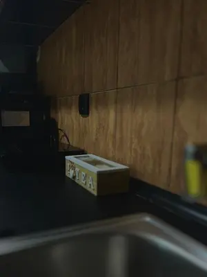a box sitting on a counter next to a sink at Apartmani Djordjevic in Belgrade