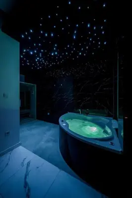 a bath tub sitting on top of a room at Bounce Belgrade Apartment in Vračar (historical)