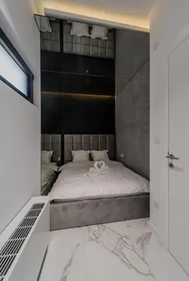 a bedroom with a large bed in a room at Bounce Belgrade Apartment in Vračar (historical)