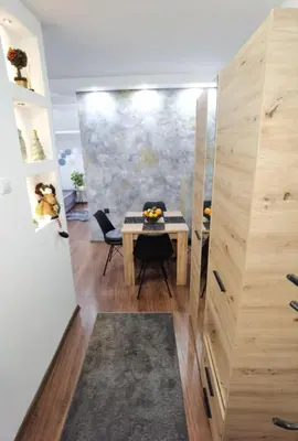 a small dining room with a table and chairs at Vidikovac in Belgrade