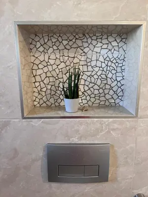 a tv sitting on a shelf with a potted plant at Villa Ana - Charming Appartments in Belgrade
