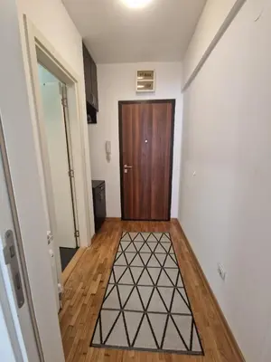 an empty hallway with a door and a floor at EMILY LUX Apartment Belgrade, Center in Belgrade