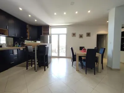 a kitchen and dining room with a table and chairs at 150sqm 3BDR Family apartment in central Belgrade in Belgrade