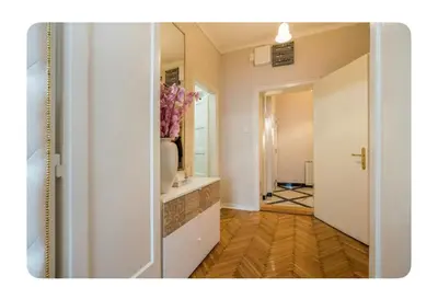 a hallway with a door leading into a room at Luxury Apartment 8 in Belgrade