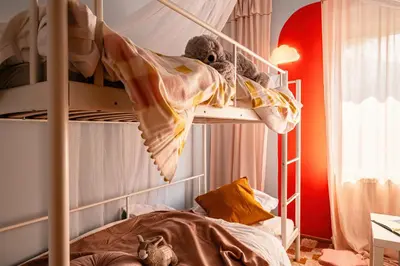 a bedroom with a bunk bed with a stuffed teddy bear on it at Play Cloud with Cinema & Foosball Old Town Heart in Belgrade