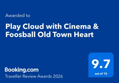 a blue sign that reads play cloud with cincinnati and foxball old town heart at Play Cloud with Cinema & Foosball Old Town Heart in Belgrade