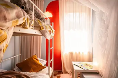 a bedroom with a bunk bed and a window at Play Cloud with Cinema & Foosball Old Town Heart in Belgrade