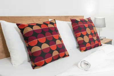 a bed with two pillows on it with at 3 BDR for 6 CENTER CLOSE TO NATIONAL MUSEUM in Belgrade